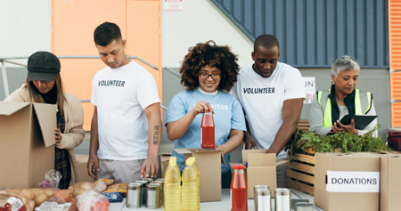 Group of people, volunteering and groceries on table for charity event with care, kindness and help....