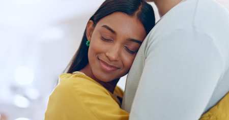 Love, mockup and woman hug partner with a smile in home or living room space with happiness. Couple,...