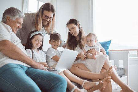 It takes a village. a young family bonding together at home.