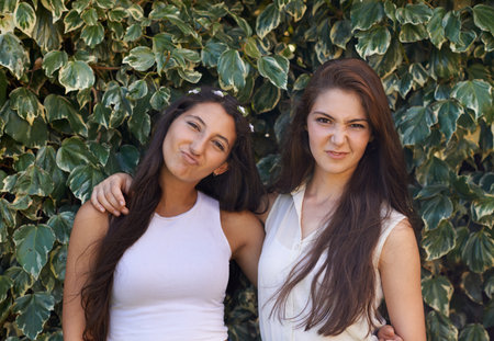 Just chilling with my girl. Two best friends spending time outdoors during their summer break.の写真素材