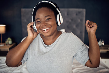 Smile, music headphones and black woman in portrait, dance and happy in home bedroom. Radio,...