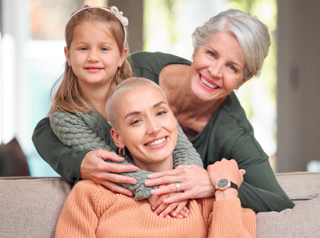 I got it from my mama. Portrait of a mature woman bonding with her daughter and granddaughter on the...