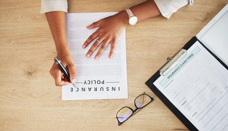 Legal form, hands and person with insurance policy and writing with document and paperwork at law...