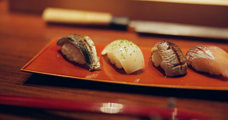 Tuna, restaurant and japanese sushi for lunch, raw fish and healthy food on plate for asian culture. Japan, cuisine and rice for vitamins on table, soy and nutrition with seafood menu for cateringの写真素材