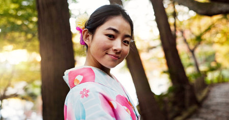 Japanese woman, portrait and kimono in forest with smile, pride and traditional clothes for culture...