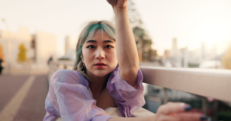 Outdoor, dance and woman with talent, face and performance with training, routine and creative industry. Portrait, contemporary dancer and Japan with summer, movement and artist with practice and sunの写真素材