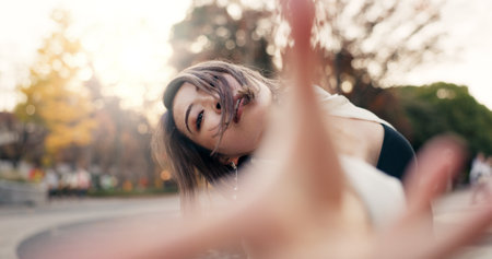 Outdoor, dancing and woman with energy, face and performance with training, routine and creative industry. Portrait, contemporary dancer and girl with summer, movement and artist with practiceの写真素材