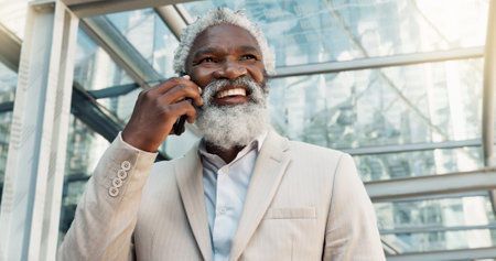 Senior black man, phone call and business conversation in city for proposal or outdoor communication. Face of mature African businessman smile and talking on mobile smartphone for discussion outsideの写真素材