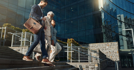 Business people, stairs and outdoor in city with conversation for travel, commute or walking to...