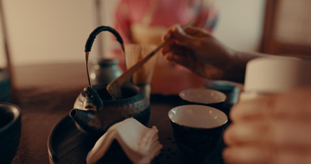 Traditional, matcha and Japanese women with tea for culture with leaves and powder in tearoom....