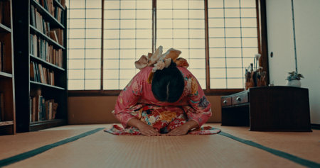 Woman, prayer and Japanese or spiritual religion in tatami room for tradition culture, respect or ritual. Asian person, kneel and kimono practice or mindfulness healing or god worship, holy or zenの写真素材