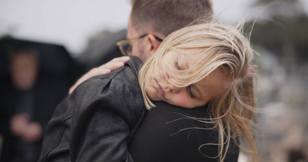 Sad, death and a daughter with her father at a funeral for grief or mourning loss together outdoor....