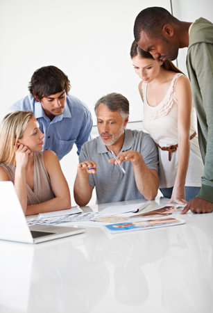 People, teamwork and paperwork or meeting brainstorming at creative agency, collaboration or problem...