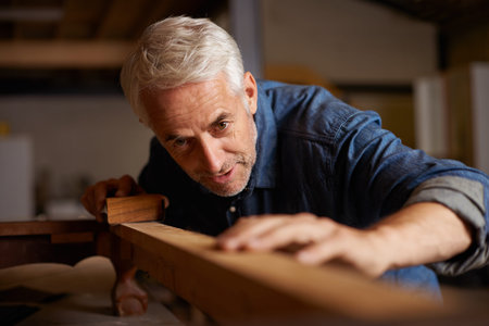 Carpenter, mature man and wood for manufacturing in workshop, industry and company of construction....