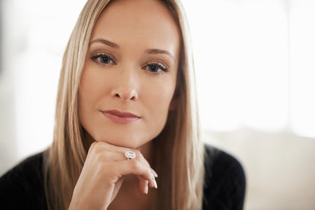 Woman, portrait and thinking for relax and idea for future or plan in home or indoor on weekend. Young person and face for thoughtful and pensive for contemplate with style and glamour on mockupの写真素材