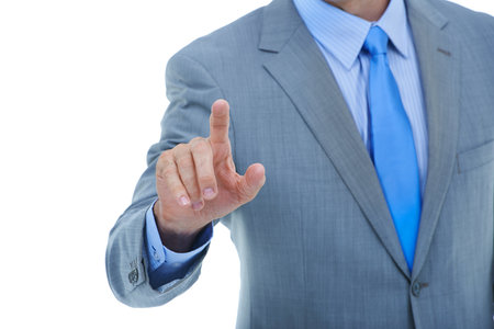 Businessman, hands and pointing with touch for UI, UX or interaction on a white studio background. Closeup of man or male person with finger on invisible interface or selection with mockup spaceの写真素材