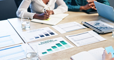 Business hands, documents and notes on graphs, charts and statistics for market research....