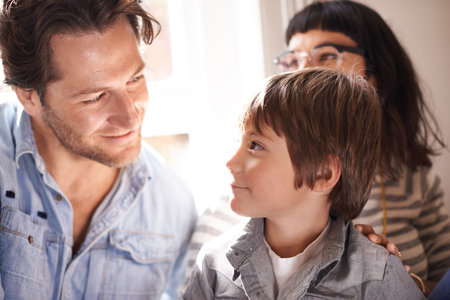 Dad, boy and smile with family in home, happy son and man bonding for child development and parent relationship. Kid, childhood vacation house and people on holiday for care, together with loveの写真素材