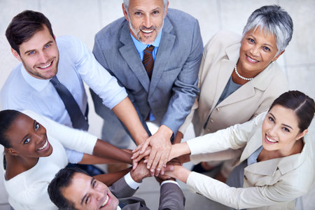 Portrait, above or business people with hands in stack for mission goals, collaboration or teamwork....