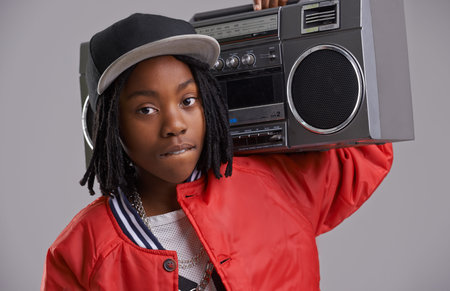 Black child, confidence and portrait with radio for hip hop, rap and swag dance with cool clothes in...