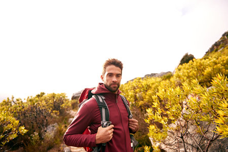 Confidence, hiking and portrait of man on mountain, nature and forest for outdoor adventure. Male...