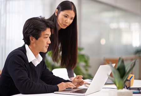 Mentor, help and laptop in office with teamwork or businessman learning from support of woman....