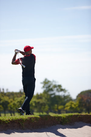 Man, stroke and club for golf tournament on field, driver and international sports or contest. Male person, athlete and equipment for back practice, training and challenge in competition on techniqueの写真素材