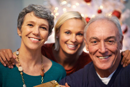 Christmas, tree and senior family in portrait with love, happy and gratitude for holiday and...