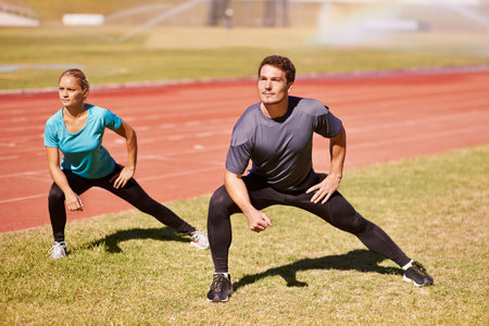 Sports, legs and people stretching at stadium for race, marathon or competition training for health....
