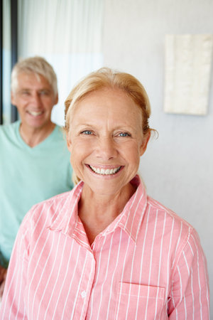Portrait, mature and couple in house with happiness, retirement and pensioner at home. Senior man,...