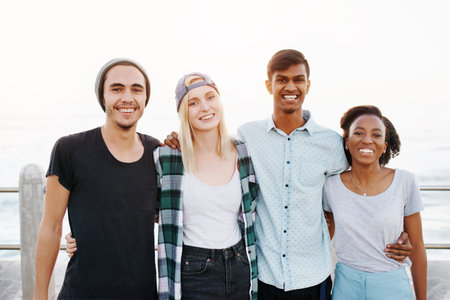 Friends, group and portrait on beach with hug for travel, bonding and happy outdoor on promenade....
