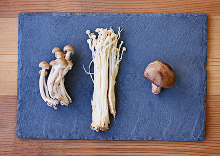 Mushrooms, board and variety for fresh food with fibre for protein in healthy diet with vegetables...