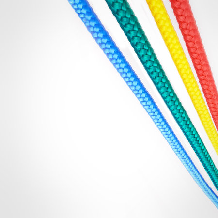 Textile, rope and string with color on background, mock up or space with nylon cable for creativity....