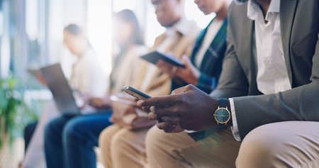 Recruitment, hiring and phone with hands of business people in waiting room for networking, social...