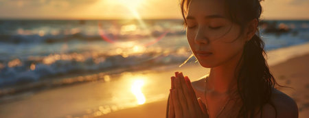 Asian woman, peace and beach with prayer at sunset for spiritual, worship in nature for Jesusの素材