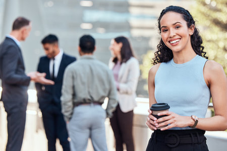 Portrait, woman and happy outdoor with coffee on break for work in confidence for career, job and opportunity. Female accountant, people and proud for growth in new York with smile ON balconyの写真素材
