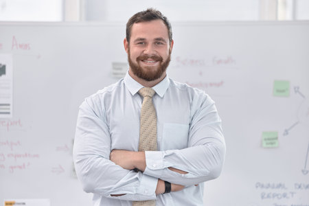 Man, confident and portrait by whiteboard in office, planning and workshop for finance or sales....