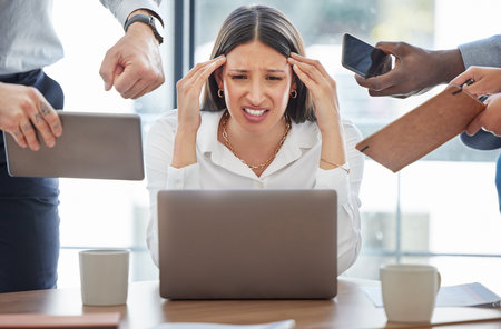 Multitasking, headache and woman overwhelmed in office with stress, burnout or accountant on audit. Frustrated, employee and anxiety for time management chaos, challenge or deadline in scheduleの写真素材