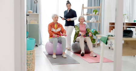 Senior woman, fitness and together with high five, personal trainer and exercise ball with workout...