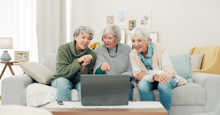 Laptop, friends and senior women on sofa online for social media, streaming movies and internet...