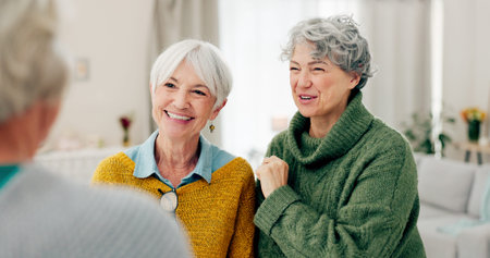 Selfie, fun and senior woman friends in a home for a visit during retirement together while looking happy. Social media, profile picture and smile with a group of elderly people bonding in a houseの写真素材