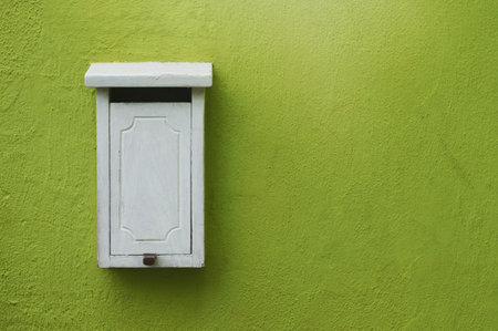 Door, letter box and mail with wall, communication and notice for postal writing. Home, property and...
