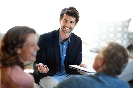 Finance, consultant and couple with accountant for advice, real estate and planning for retirement fund. Trading, group and man with woman, accounting and broker with mortgage insurance or investmentの写真素材