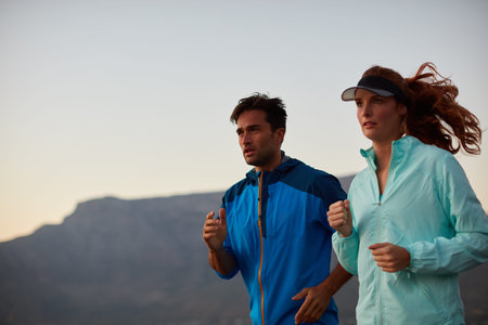 Couple, running and sports exercise in outdoor, morning and cardio challenge or marathon training....