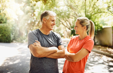 Couple, nature and smile for running people, exercise and cardio training for man and woman. Workout, sports and wellness for body health and athlete people, weekend and street for fitness wellbeingの写真素材