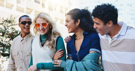 Group, friends and fashion in city with laugh outdoor for travel, journey and urban town. Happy,...