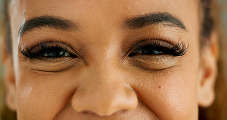 Closeup, eyes and woman with lashes, face and glaucoma exam with optical assessment and eye care. Portrait, person and model with wellness and ophthalmology with healthy eyesight, vision or optometryの写真素材