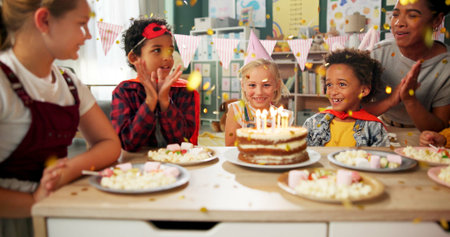 Birthday, party and children with blowing of candles for celebration, development and growth of...