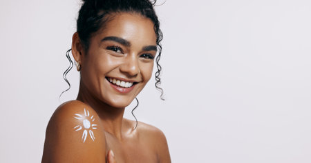 Skincare, portrait and woman with natural cream in studio for smile, dermatology or sunscreen. Body, cosmetics or glow of lady for lotion, anti aging products and treatment on white background mockupの写真素材