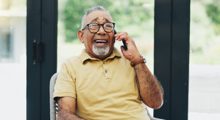 Home, phone call and funny with senior man, communication and network with joke, digital app and smile in living room. Pensioner, apartment and happy mature guy with smartphone, humor and laughingの写真素材